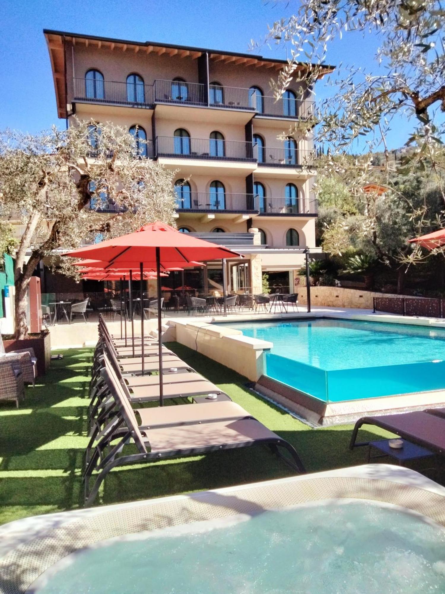 Hotel Ristorante Al Caminetto Worldhotels Crafted Adults Only ตอร์รีเดลเบนาโก ภายนอก รูปภาพ